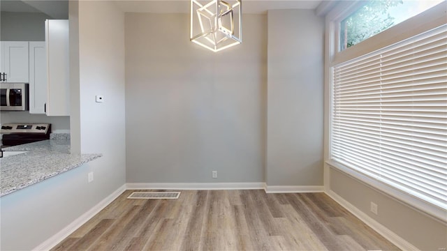 dining space featuring light hardwood / wood-style flooring