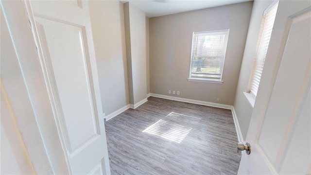 bedroom with hardwood / wood-style flooring