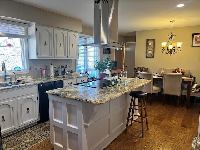 kitchen featuring black appliances, sink, dark hardwood / wood-style flooring, white cabinetry, and island exhaust hood