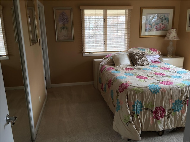 bedroom with light carpet