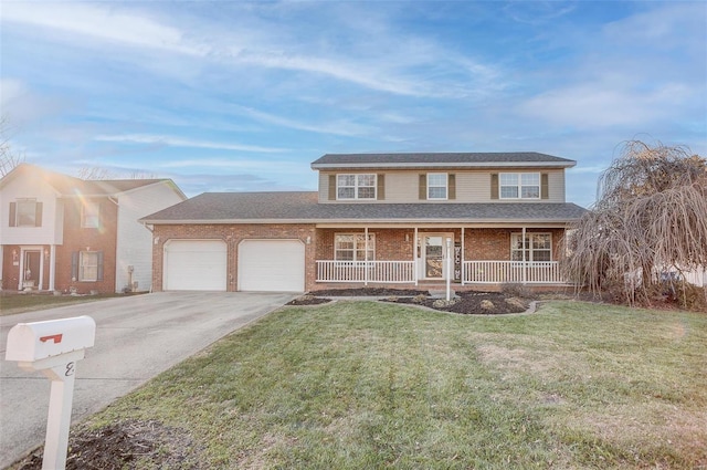 view of front of house with a front lawn, a porch, and a garage