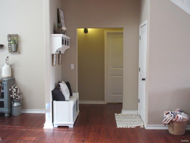 hall featuring dark hardwood / wood-style flooring