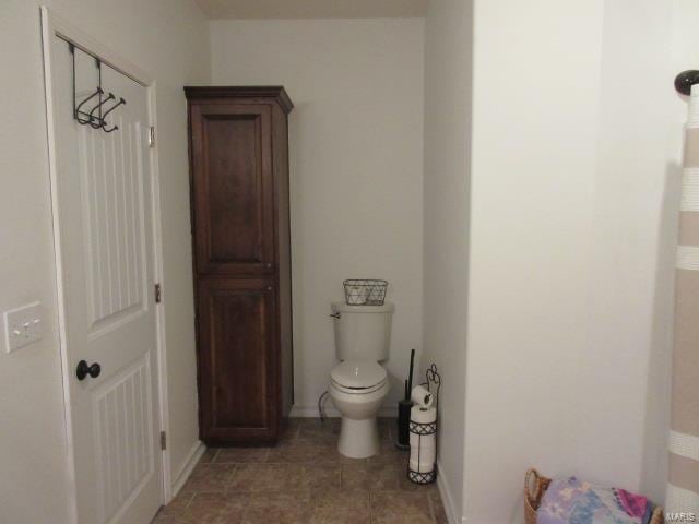 bathroom featuring toilet