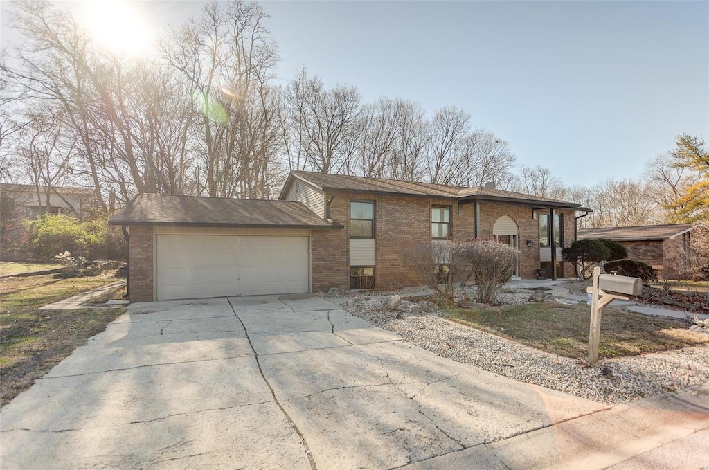 single story home featuring a garage