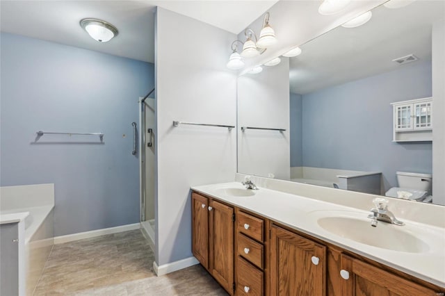 full bathroom with vanity, toilet, and plus walk in shower