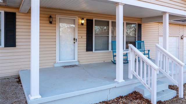 entrance to property with a porch