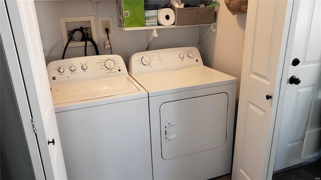 laundry room featuring washer and clothes dryer