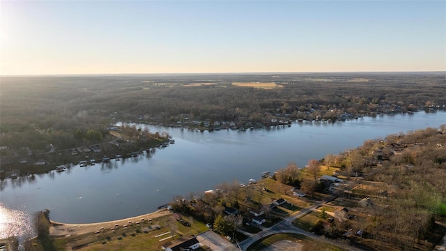 aerial view at dusk with a water view