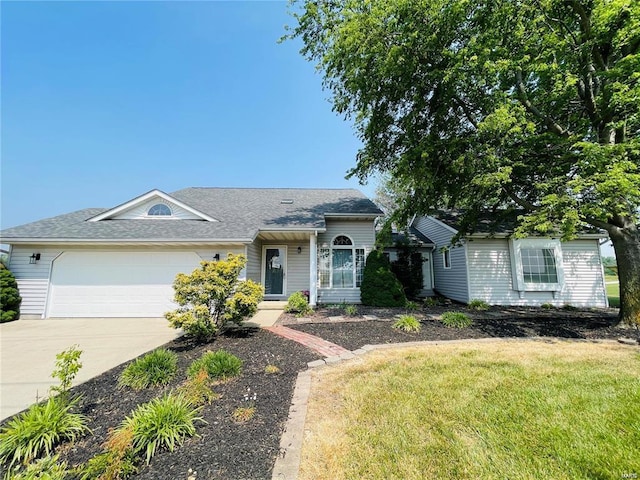 ranch-style home with a garage and a front lawn