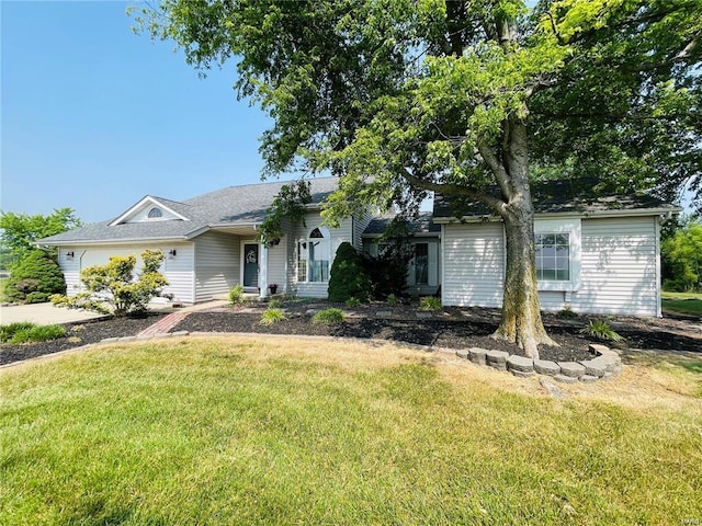 ranch-style house with a front yard