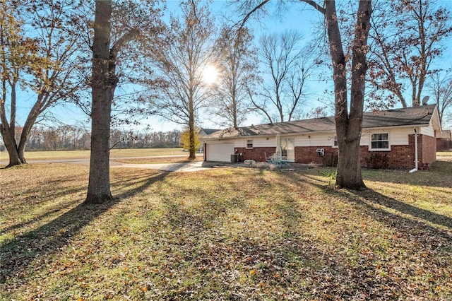 view of yard with a garage