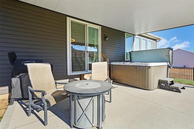 view of patio with a hot tub