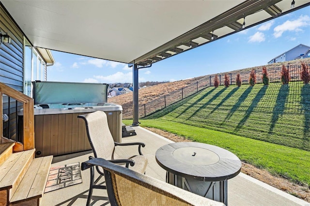 view of patio featuring a hot tub