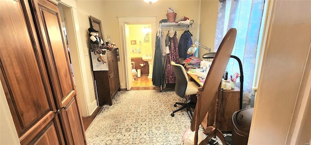 office with wood-type flooring