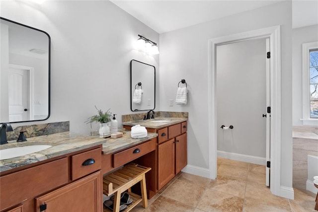 bathroom with vanity and tile patterned floors