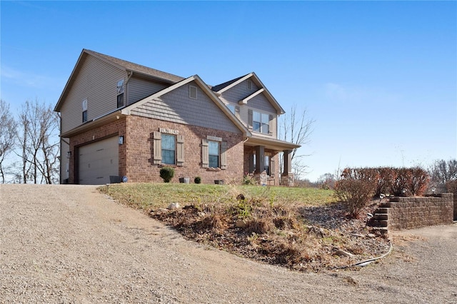 craftsman-style home with a garage