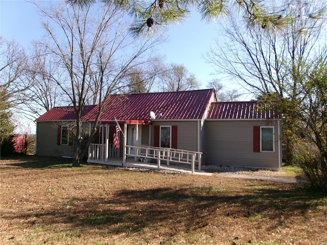 ranch-style house with a front lawn