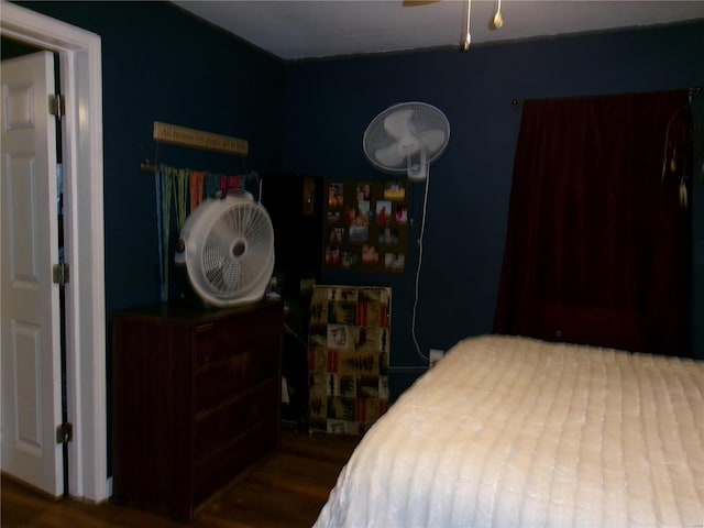 bedroom featuring dark wood-type flooring