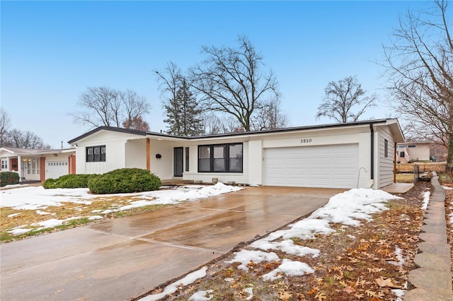 ranch-style home with a garage