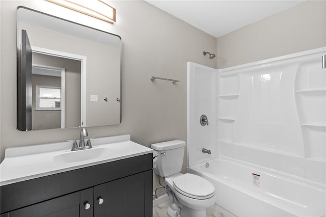 full bathroom with vanity, toilet, and washtub / shower combination