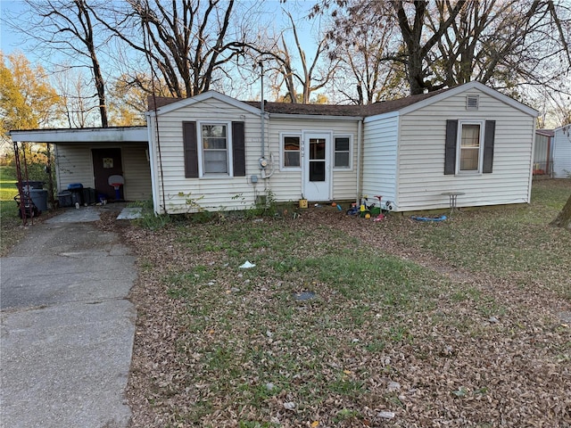 view of front of property with a carport