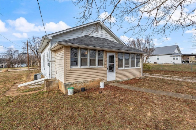 bungalow-style house with central AC