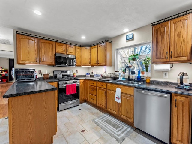 kitchen with sink and stainless steel appliances