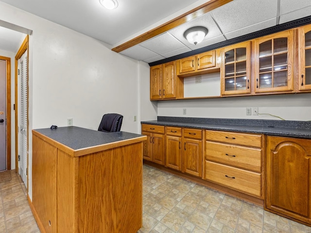 kitchen with a paneled ceiling