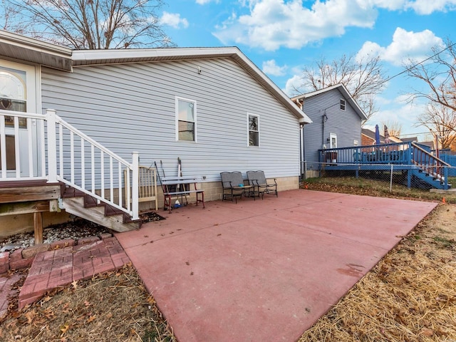 rear view of property with a patio