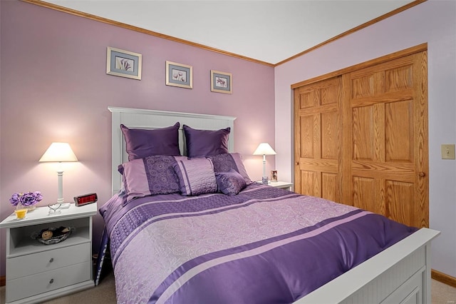 bedroom with carpet floors and crown molding