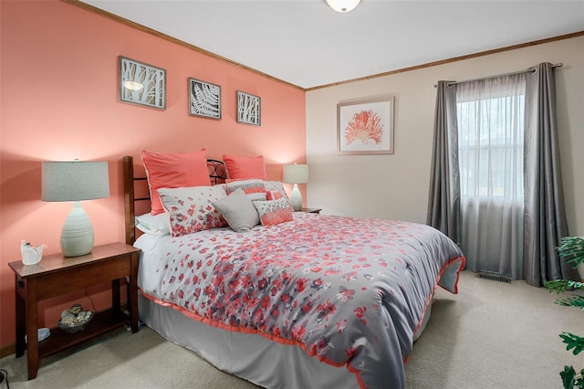 bedroom featuring crown molding and carpet floors