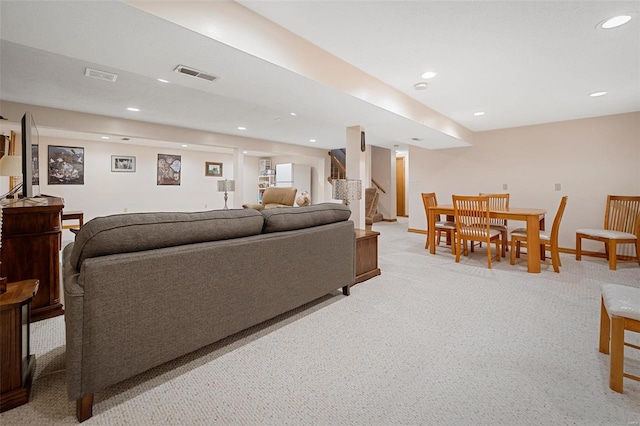 living room featuring light colored carpet