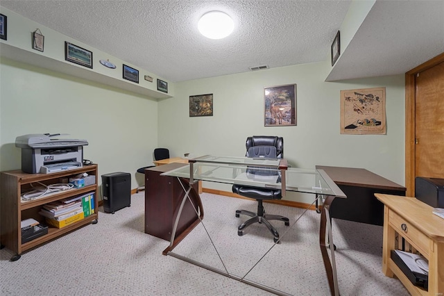 home office with a textured ceiling