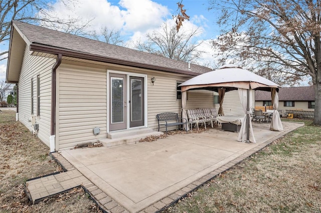 back of house featuring a gazebo and a patio area