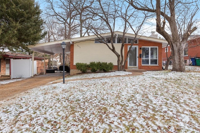 view of front of house featuring a carport