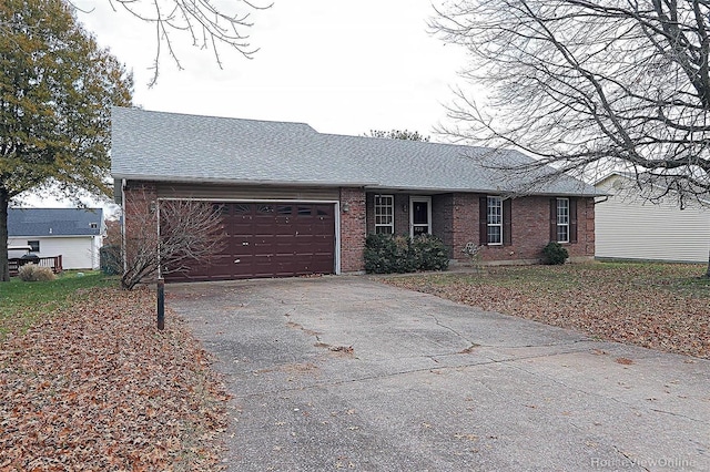 single story home with a garage