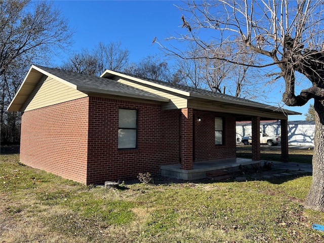 view of property exterior with a lawn