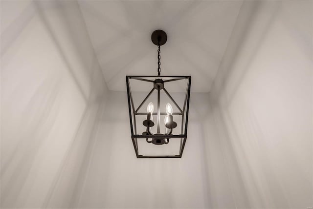 interior details featuring a chandelier