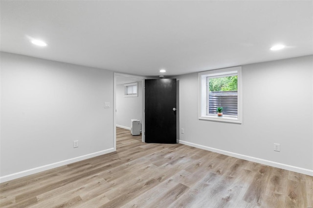 basement with light wood-type flooring