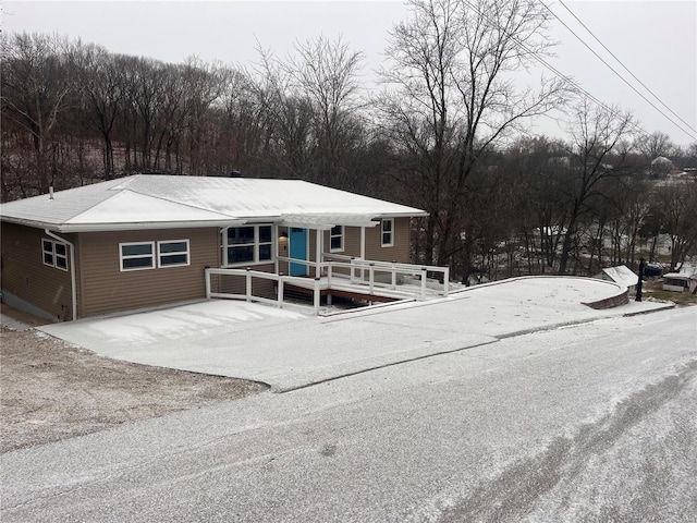 view of front of house featuring a deck