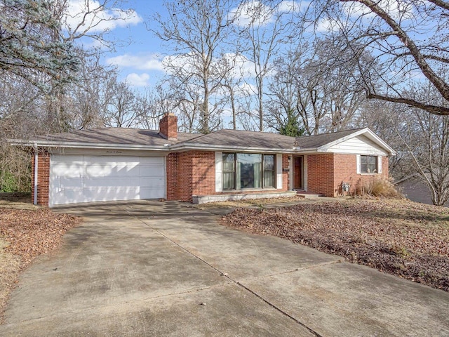 ranch-style home featuring a garage