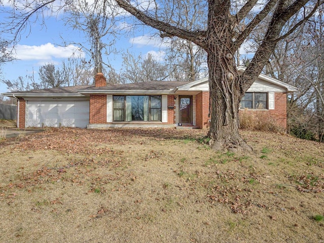 single story home featuring a garage