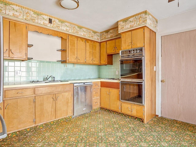 kitchen with decorative backsplash, stainless steel dishwasher, double oven, and sink