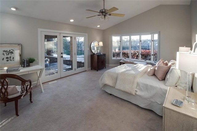 bedroom with ceiling fan, vaulted ceiling, access to exterior, and multiple windows