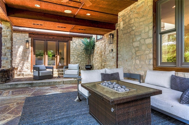 view of patio / terrace featuring ceiling fan