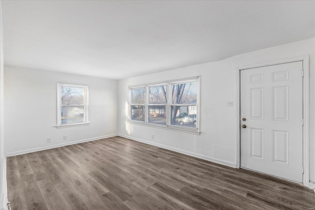 interior space with dark hardwood / wood-style flooring