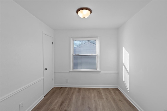 spare room featuring hardwood / wood-style floors