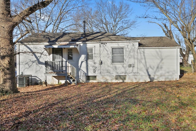 back of property with central AC unit