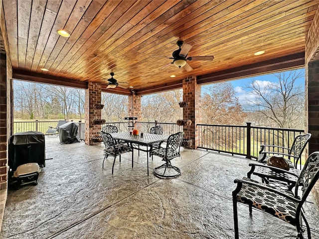 view of patio featuring ceiling fan