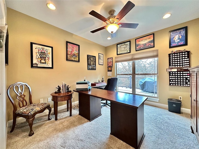 carpeted office with ceiling fan